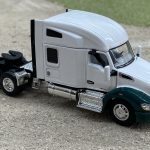 Green and White Kenworth T680 Cab