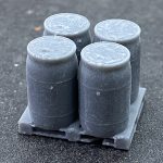 Pallet with 4 Plastic Barrels